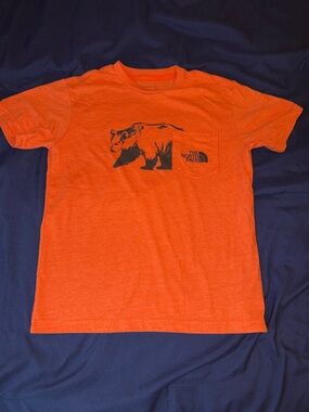 The North Face youth large Bright Orange Bear Graphic Pocket Tee